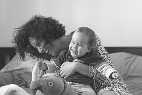 Mother and daughter laughing together